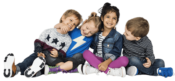 Photo of a group of 4 kids sitting together.